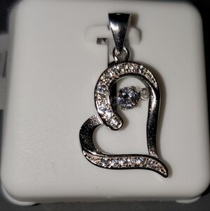 NWT Sterling silver heart pendant with a floating center CZ.